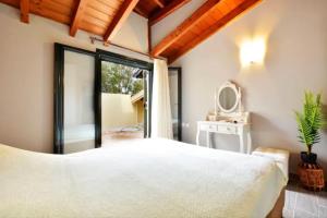 Posteľ alebo postele v izbe v ubytovaní Anemomilos Casa ideale 1st floor