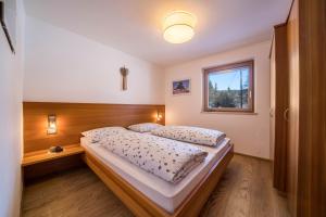Posteľ alebo postele v izbe v ubytovaní Ferienwohnung Kratzberg Edelweiss