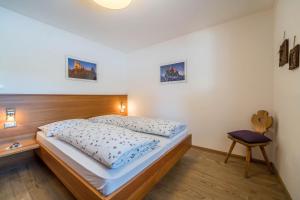 Posteľ alebo postele v izbe v ubytovaní Ferienwohnung Kratzberg Edelweiss