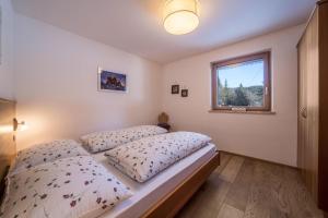 Posteľ alebo postele v izbe v ubytovaní Ferienwohnung Kratzberg Edelweiss
