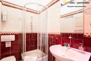 Łazienka w obiekcie Baltic Apartments - Apartamenty Korony Piastów