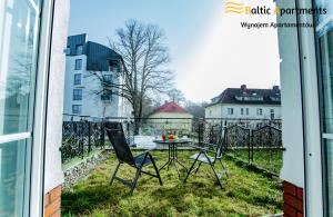Ogród w obiekcie Baltic Apartments - Apartamenty Korony Piastów