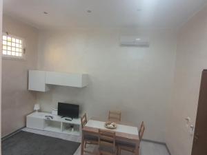 TV a/nebo společenská místnost v ubytování Castellano Home - Ursino