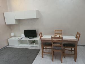 TV a/nebo společenská místnost v ubytování Castellano Home - Ursino