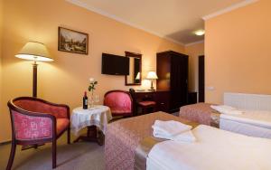 Posteľ alebo postele v izbe v ubytovaní Hotel Adam & Spa