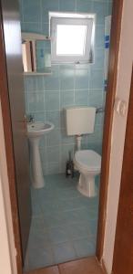 Kúpeľňa v ubytovaní Apartments Stojanović