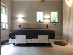 מיטה או מיטות בחדר ב-Modern Palace Emma Staete