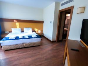 Postel nebo postele na pokoji v ubytování Afytos Bodrum City