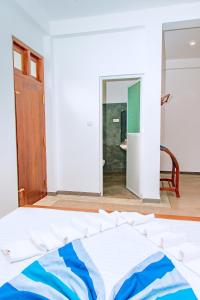 Postel nebo postele na pokoji v ubytování La Serene Resort