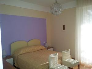Кровать или кровати в номере Hotel Meridiana
