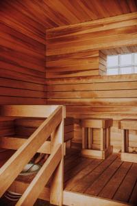 an inside view of a wooden sauna at Kevade Guesthouse with Sauna in Kuressaare