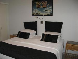 Ένα ή περισσότερα κρεβάτια σε δωμάτιο στο Aqua Vista Accommodation