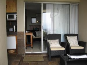 Η κουζίνα ή μικρή κουζίνα στο Aqua Vista Accommodation