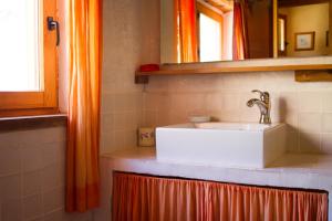 a bathroom with a sink and a mirror at Casa de campo Laldeta in Puertomingalvo +34 photos