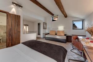 Un pat sau paturi într-o cameră la Bosco Della Spina