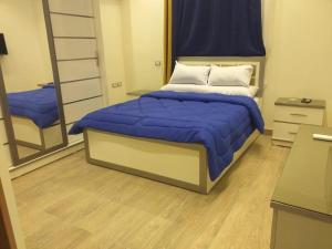 Postel nebo postele na pokoji v ubytování Ramco For Furnished Apartments And Accommodation Compound Leila