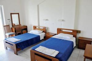 Кровать или кровати в номере Corfu Sea Gardens Hotel