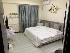 浯洲忆客房内的一张或多张床位