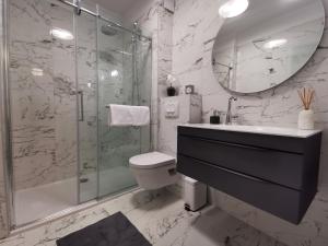 Koupelna v ubytování Merla Luxury Rooms + 24 fotografií