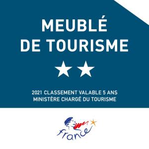 a label for a module de tourrance with white stars at UR ONDOAN - Appartement Saint Pée sur Nivelle in Saint-Pée-sur-Nivelle