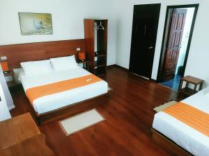 Voodi või voodid majutusasutuse HOSTAL TERO REAL toas