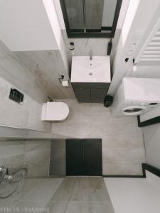 Kúpeľňa v ubytovaní MiłoMi Apartamenty Kołobrzeg