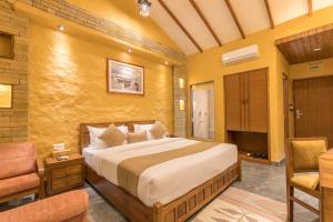 Ένα ή περισσότερα κρεβάτια σε δωμάτιο στο Bar Peepal Resort