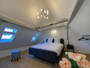 Postel nebo postele na pokoji v ubytování DUPLEX Le 12 - Appartement avec terrasse dans le vignoble - 5 mn du centre de Colmar