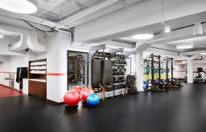 a gym with a bunch of balls on the floor at TWA Hotel at JFK Airport in Queens