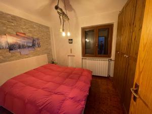 Postel nebo postele na pokoji v ubytování Appartamento in residence Ovindoli