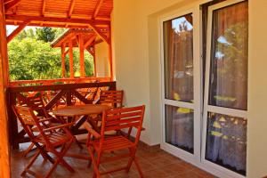 Μπαλκόνι ή βεράντα στο Ośrodek Wypoczynkowy Bungalowy