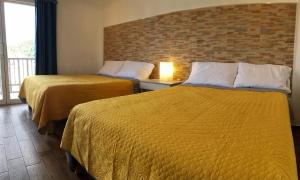 Postel nebo postele na pokoji v ubytování HOTEL COLIBRÍ