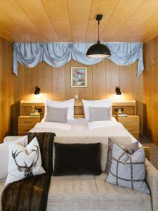Ein Bett oder Betten in einem Zimmer der Unterkunft Garni Fany