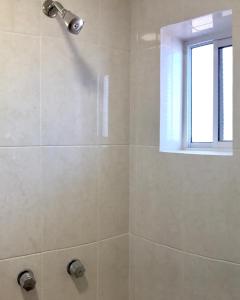 Koupelna v ubytování HOTEL COLIBRÍ
