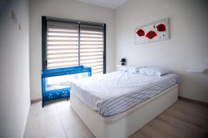 Cama o camas de una habitación en AlegriaVilla - COSY