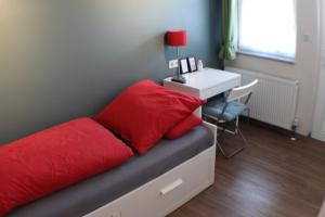 Ein Sitzbereich in der Unterkunft Bed Taste