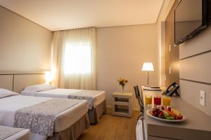 Cama ou camas em um quarto em Viale Tower Hotel