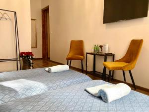 Posteľ alebo postele v izbe v ubytovaní Topolove Rooms & Apartments