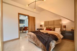 Posteľ alebo postele v izbe v ubytovaní Apartament Royal Szczyrk