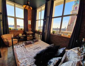 Posteľ alebo postele v izbe v ubytovaní LOFT 57 CENTRUM