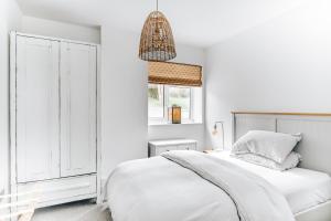 Ein Bett oder Betten in einem Zimmer der Unterkunft The Gate Cornwall