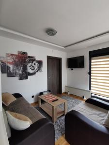 Posezení v ubytování Apartman NINA Bombonjera