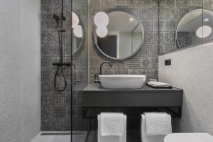 Kúpeľňa v ubytovaní Bumblebee Luxury Apartments 2 + 22 fotografií