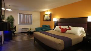 Postel nebo postele na pokoji v ubytování Dreamz Inn
