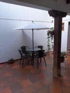A patio or other outdoor area at Cemandy Hostal