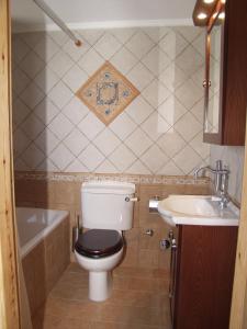 Ванная комната в Michaela Beach Houses
