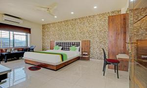 Ένα ή περισσότερα κρεβάτια σε δωμάτιο στο Treebo Golden Heights +35 φωτογραφίες
