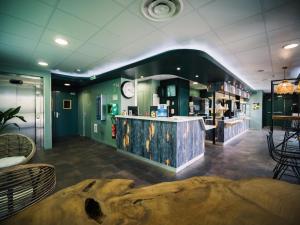Lounge nebo bar v ubytování ibis budget Bordeaux Aéroport