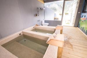 Fotografie z fotogalerie ubytování Mountain Moon Hot Spring Camp Site v destinaci Liugui