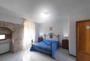 Postel nebo postele na pokoji v ubytování Residenza Di Via Piccardi